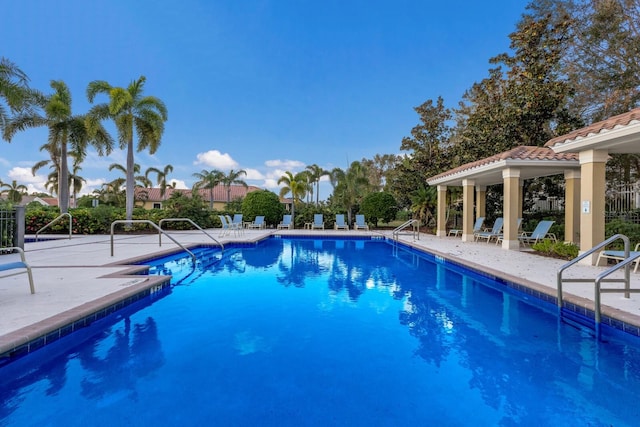 view of pool featuring a patio and a gazebo