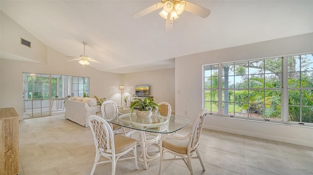 dining area featuring lofted ceiling, plenty of natural light, visible vents, and ceiling fan