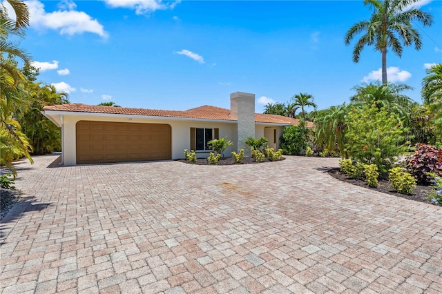 view of front of property featuring a garage