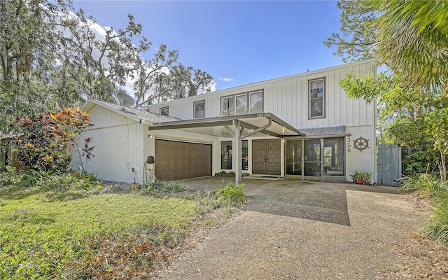 view of front of home with a garage