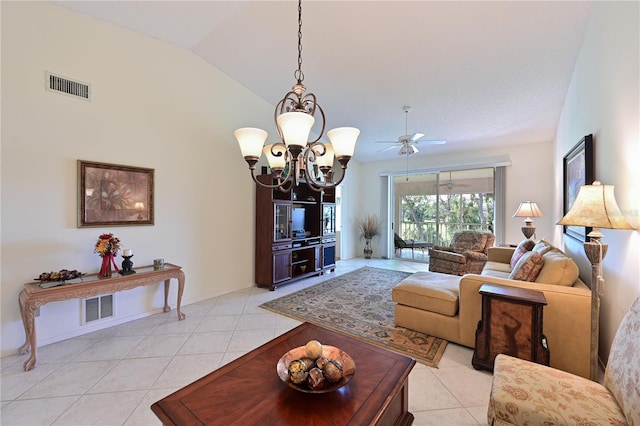 tiled living room featuring lofted ceiling and ceiling fan with notable chandelier