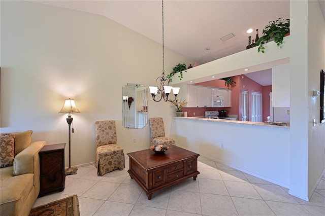 interior space with a notable chandelier, high vaulted ceiling, and light tile patterned flooring