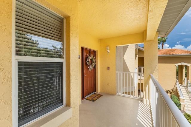 doorway to property with a balcony