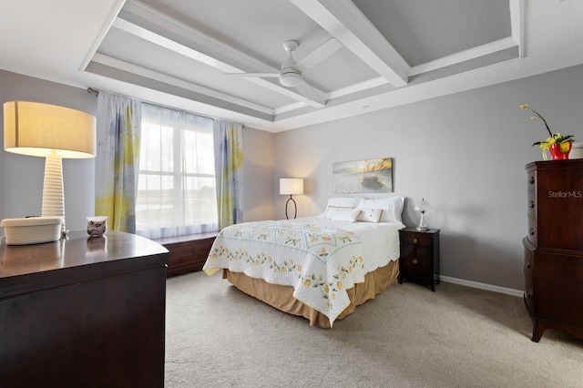 bedroom featuring beamed ceiling, ornamental molding, ceiling fan, and carpet