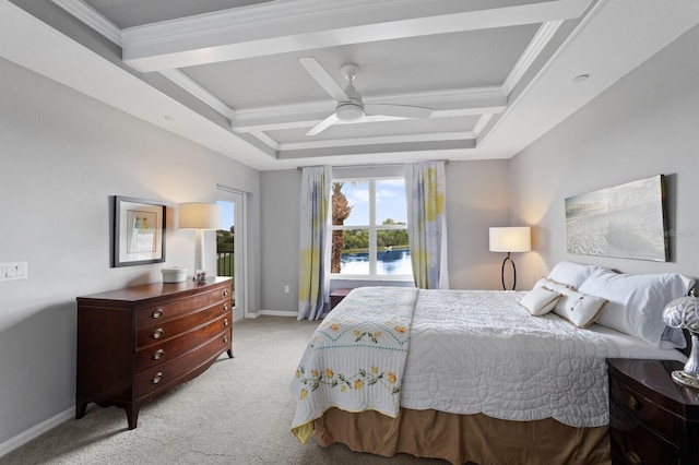 carpeted bedroom with ornamental molding, a water view, and ceiling fan