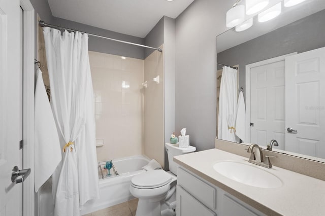 full bathroom featuring shower / bathtub combination with curtain, vanity, tile patterned flooring, and toilet