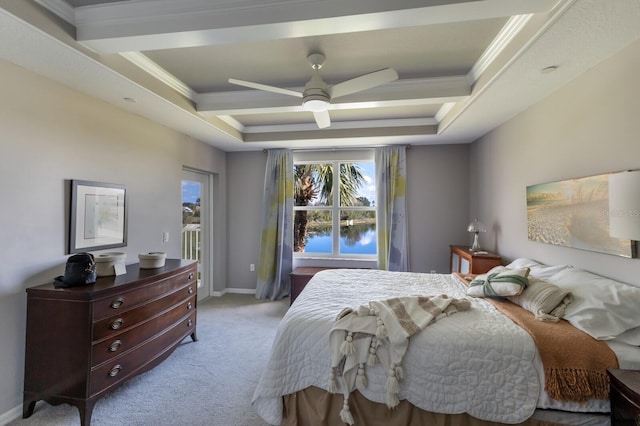 carpeted bedroom featuring access to exterior, crown molding, a raised ceiling, and ceiling fan