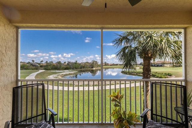 sunroom with a water view