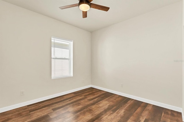 unfurnished room with dark wood-type flooring and ceiling fan