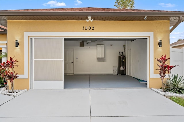 garage featuring water heater