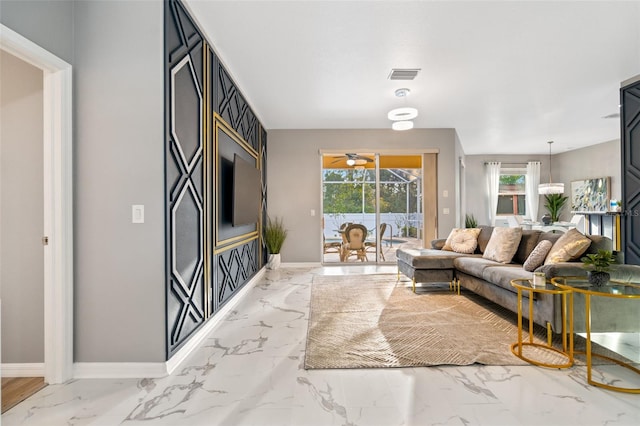 living room featuring ceiling fan