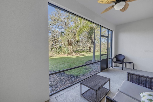 sunroom / solarium with ceiling fan