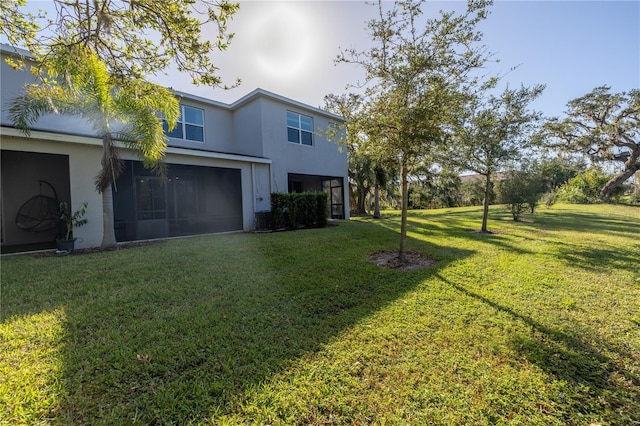 view of yard with a garage