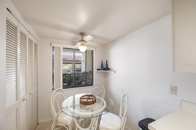 dining area with ceiling fan