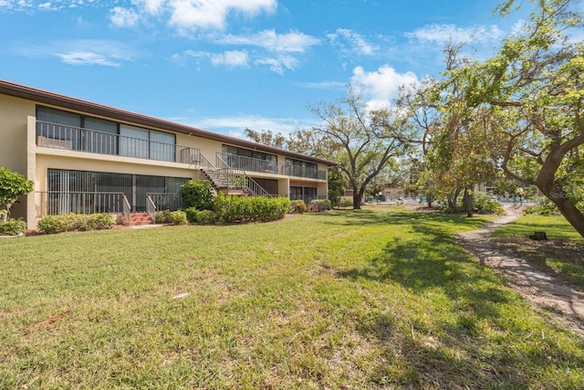 6435 Egret Ln Unit 409, Bradenton, FL 34210 - view of yard featuring stairway