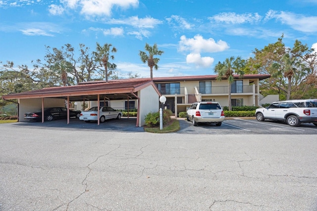 exterior space featuring a carport