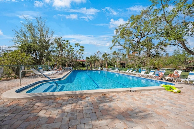 view of pool featuring a patio