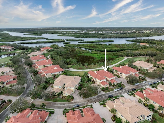 bird's eye view with a water view