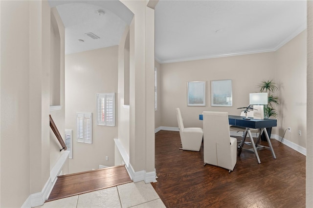 office with dark hardwood / wood-style floors and ornamental molding