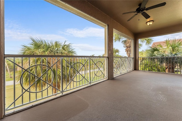 balcony featuring ceiling fan