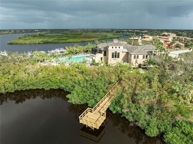 birds eye view of property featuring a water view