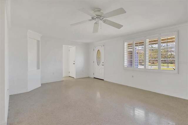 spare room with ceiling fan