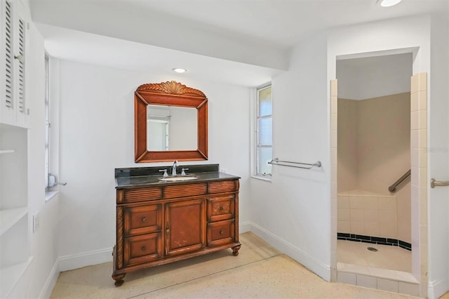 bathroom featuring vanity and walk in shower