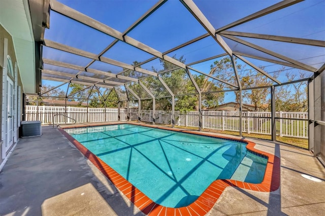 view of pool featuring a patio and a lanai