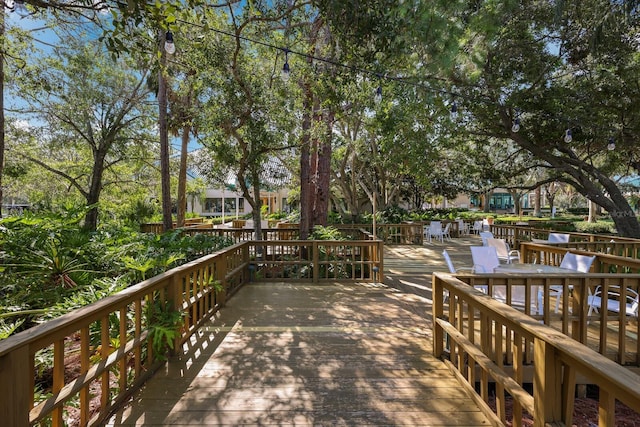 exterior space with a deck with water view