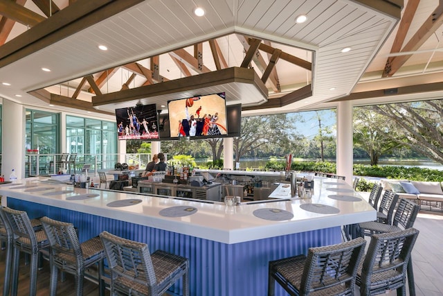 exterior space featuring hardwood / wood-style floors and vaulted ceiling