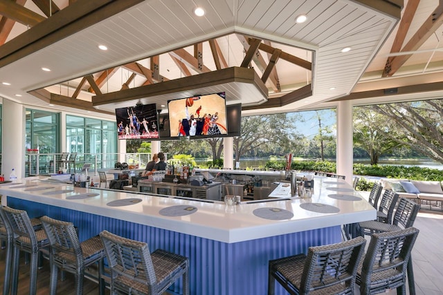 bar featuring recessed lighting, wood ceiling, lofted ceiling, and wood finished floors