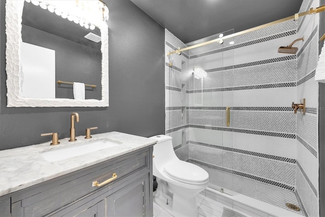 bathroom featuring vanity, walk in shower, toilet, and tile patterned flooring