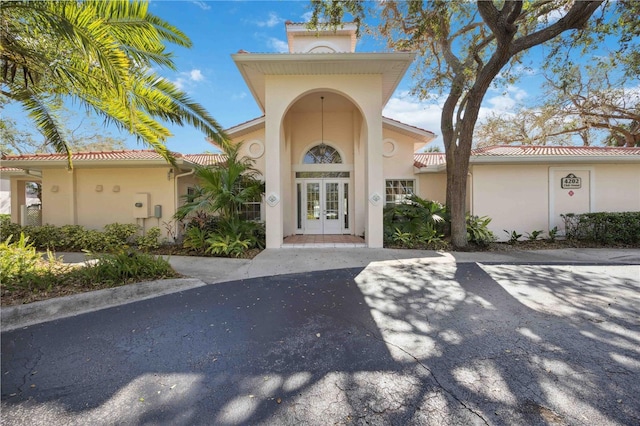 view of exterior entry with french doors