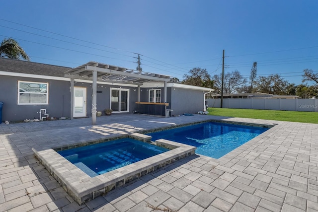 view of pool with an in ground hot tub, a pergola, a yard, and a patio