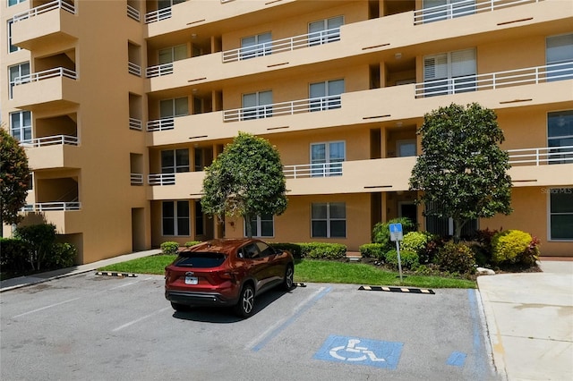 4550 Pinebrook Cir Unit 103, Bradenton, FL 34209 - view of property with uncovered parking