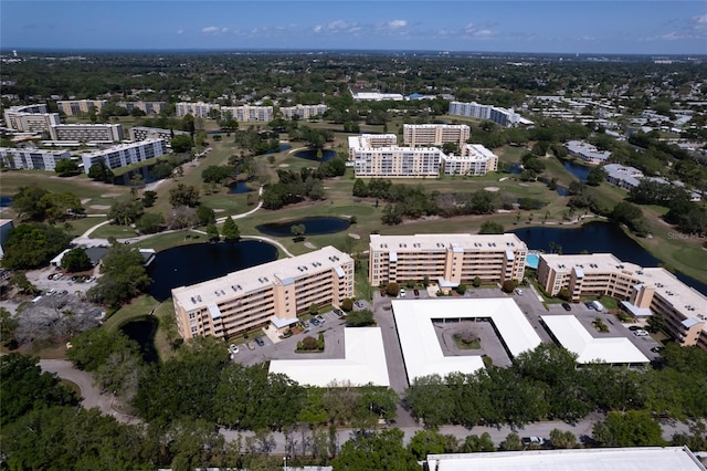 drone / aerial view with a water view