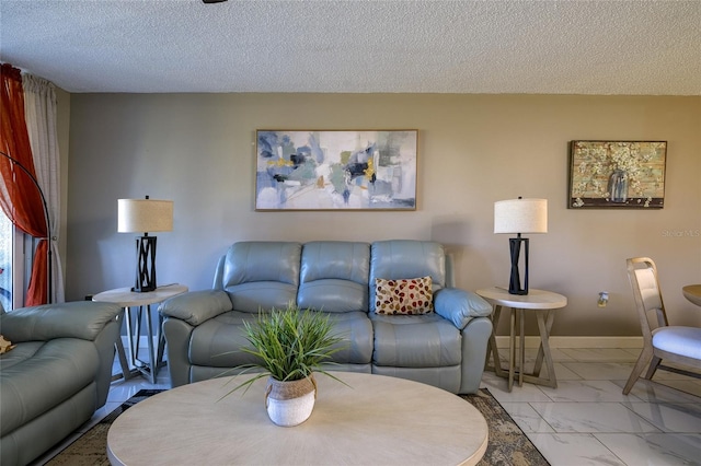 living room with a textured ceiling