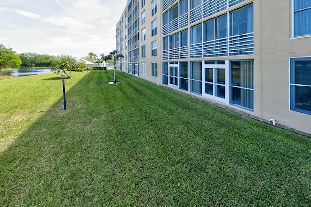 4550 Pinebrook Cir Unit 103, Bradenton, FL 34209 - view of home's community with a lawn and a water view