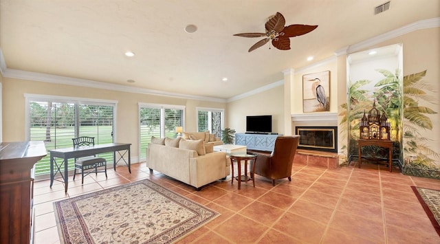 tiled living room featuring crown molding, lofted ceiling, and ceiling fan