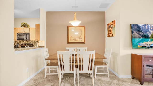 view of tiled dining room