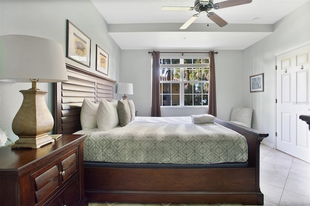 tiled bedroom with ceiling fan