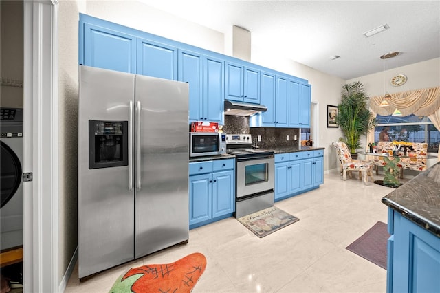 kitchen with backsplash, stainless steel appliances, decorative light fixtures, dark stone countertops, and blue cabinetry