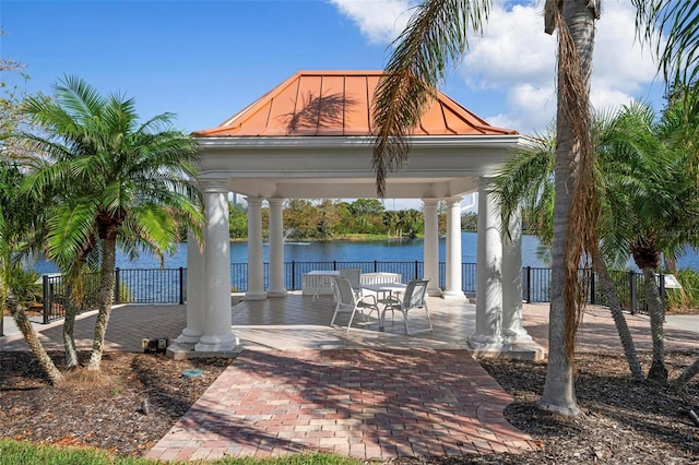 exterior space featuring a water view and a gazebo