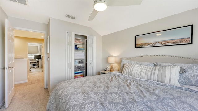 bedroom featuring ceiling fan, light carpet, and vaulted ceiling