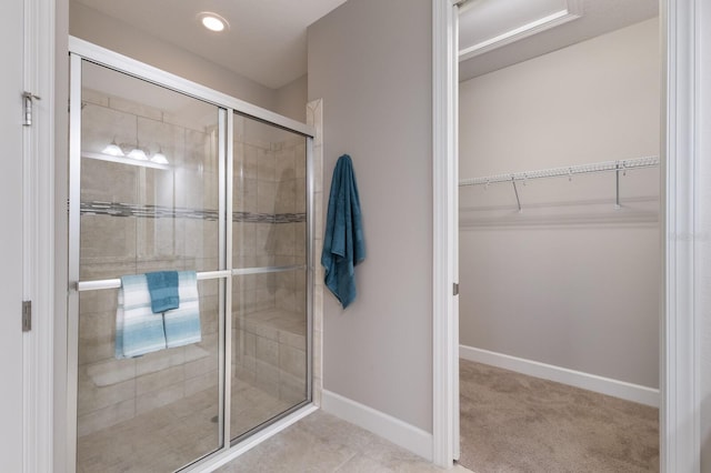 bathroom featuring an enclosed shower