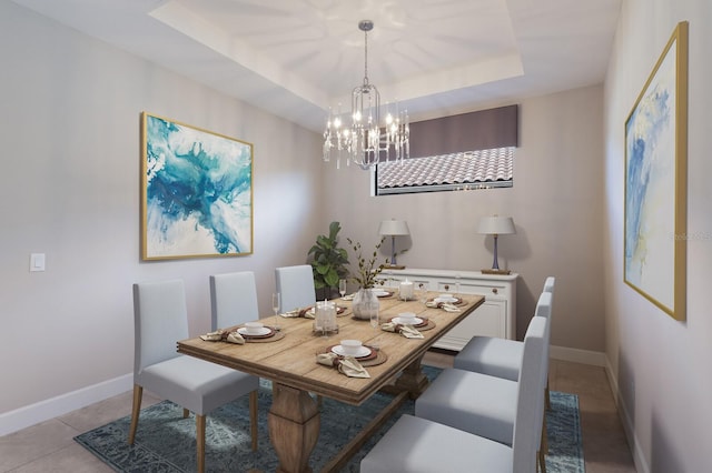 tiled dining space featuring a raised ceiling and a chandelier