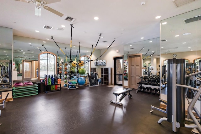 workout area featuring ceiling fan