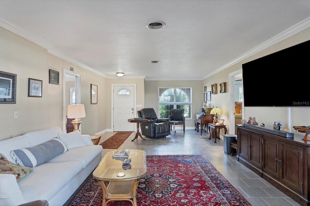 living room featuring crown molding