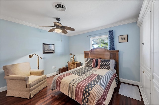 bedroom featuring crown molding, dark hardwood / wood-style floors, and ceiling fan