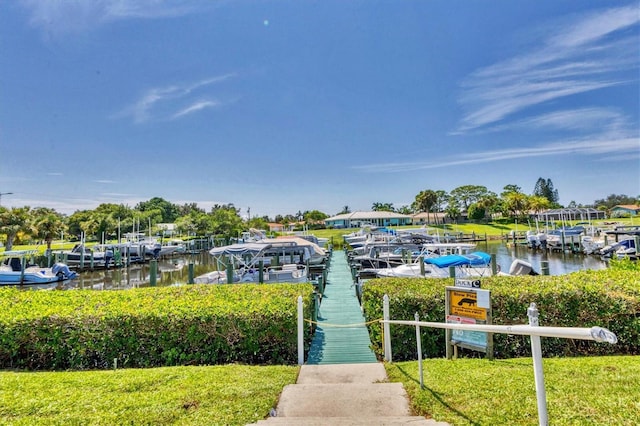 exterior space featuring a water view and a yard